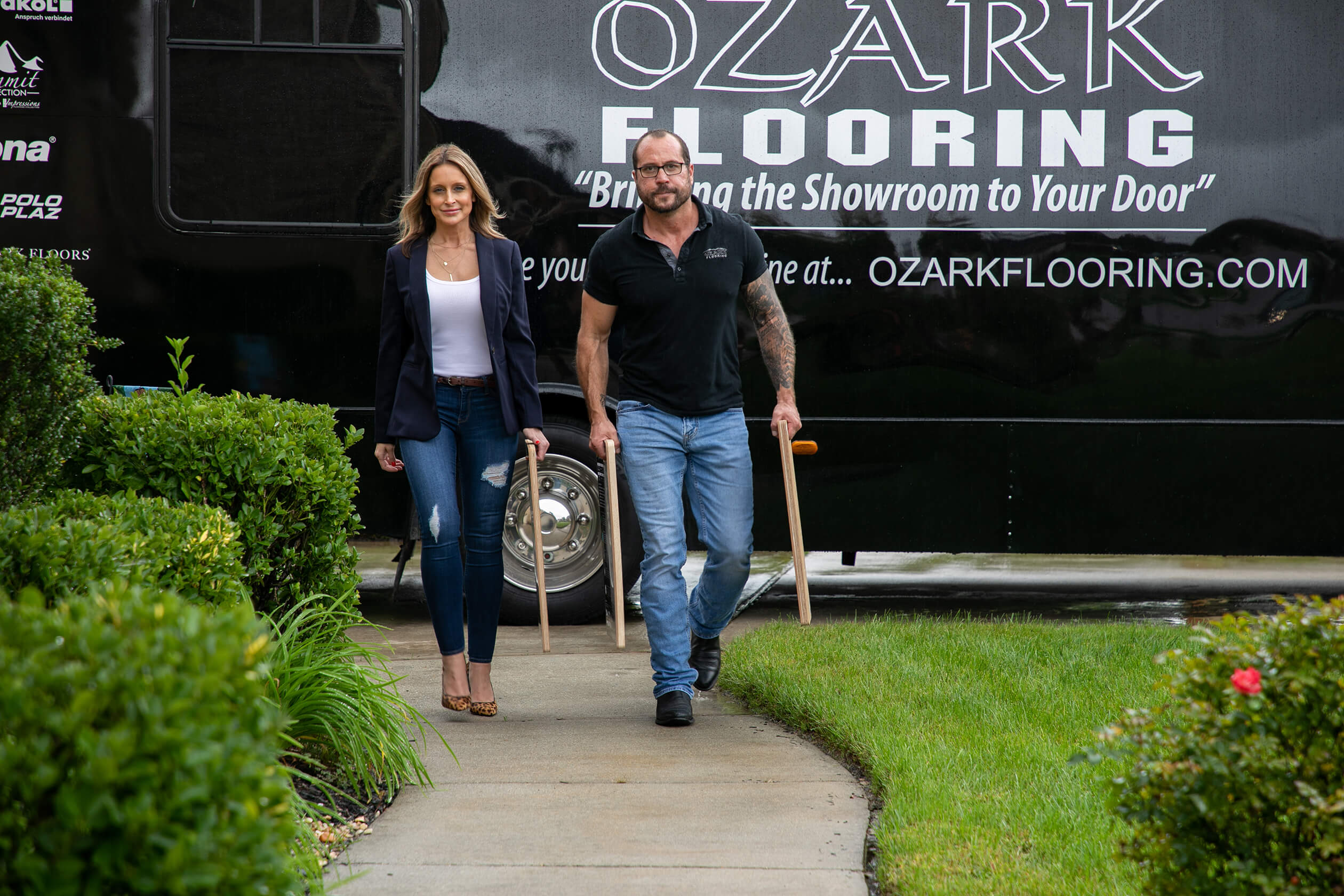Mobile showroom with owner and wife