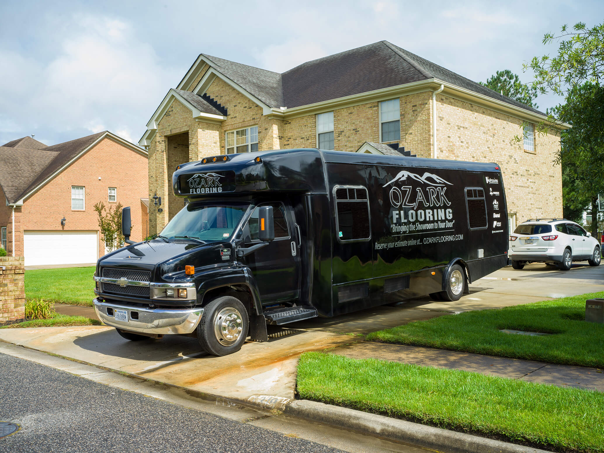 Mobile showroom with owner and wife
