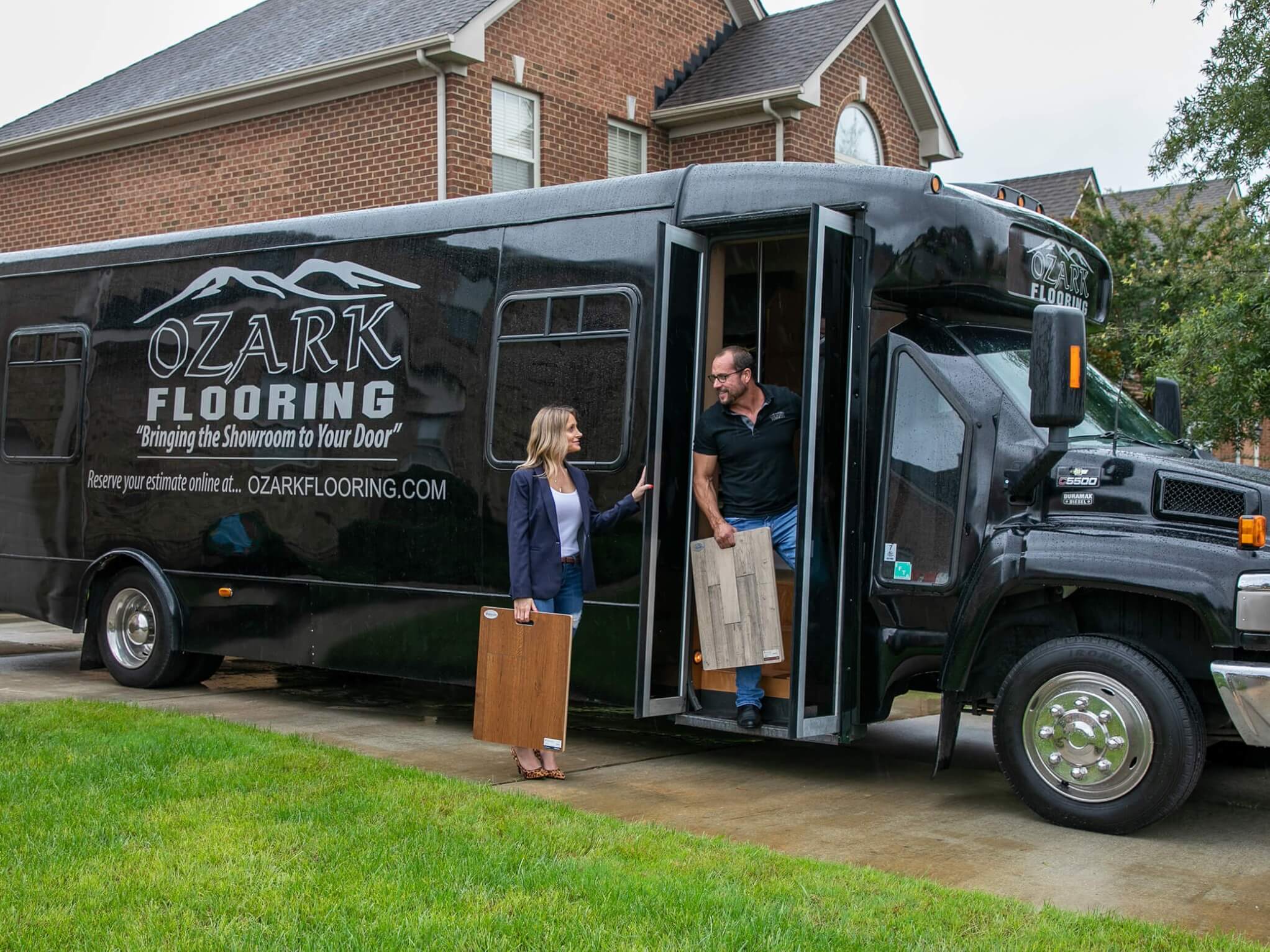 Mobile showroom with owner and wife